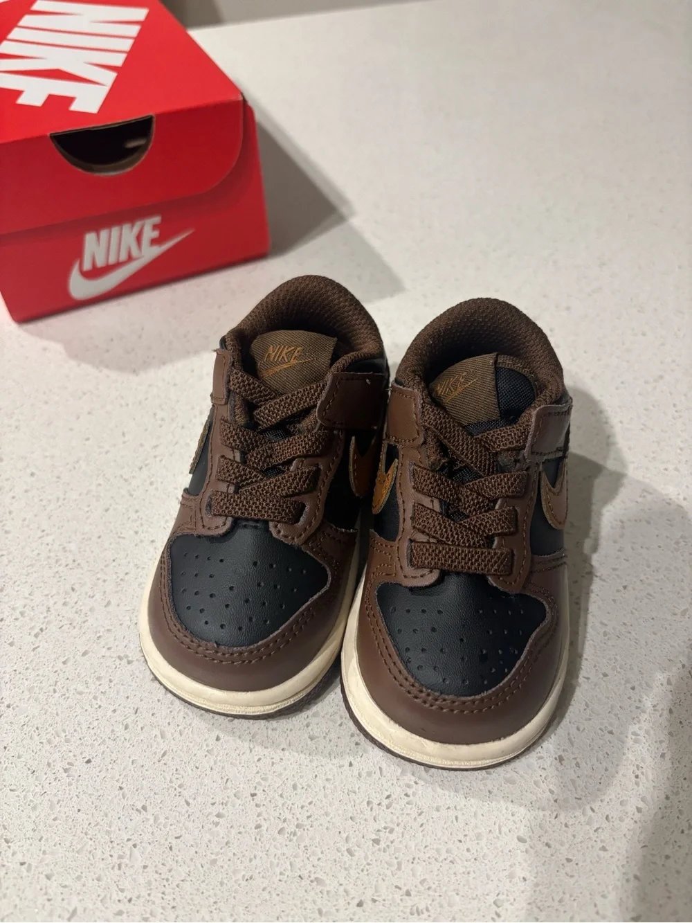 Nike Kids Low-Top Sneakers in Brown and Black with Tan Swoosh
